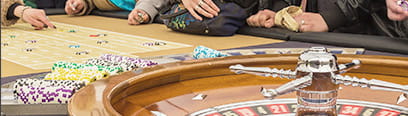 Roulette players at a casino table
