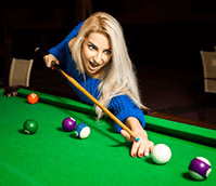 Woman playing pool